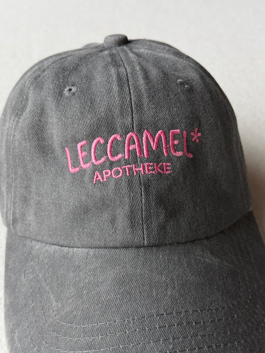 Cappello con visiera "Leccamel*"